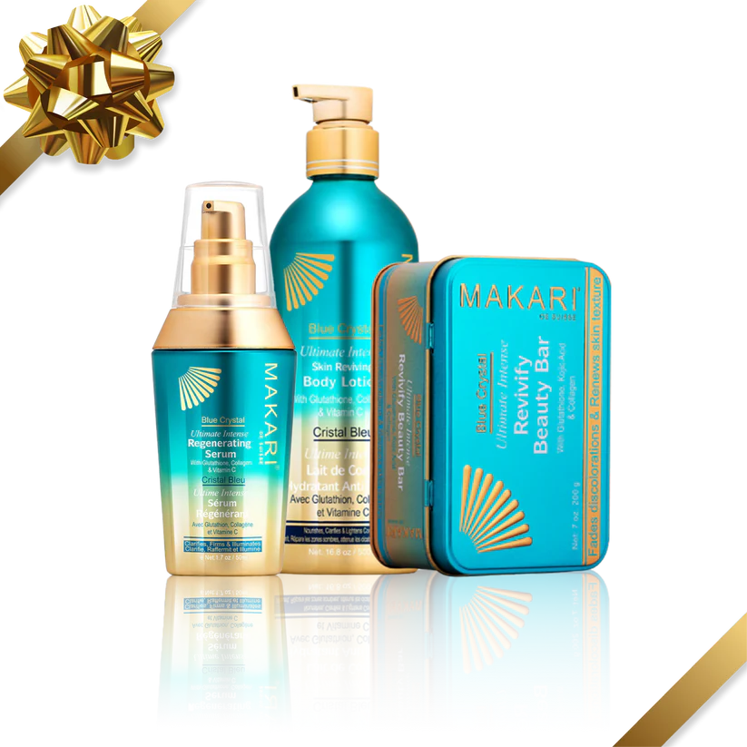 Makari skincare products including serum, lotion, and beauty bar with a gold bow on a white background. Blue Crystal