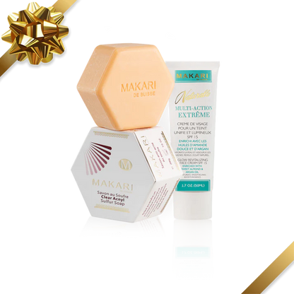 Makari skincare products with a gold bow on a white background | Makari de Suisse Uganda