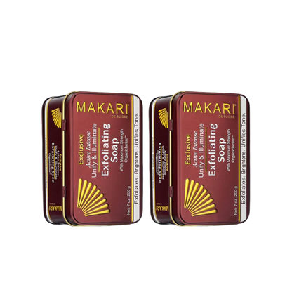Two Makari Exfoliating Soap bars in red packaging with yellow accents on a white background | Makari de Suisse Uganda
