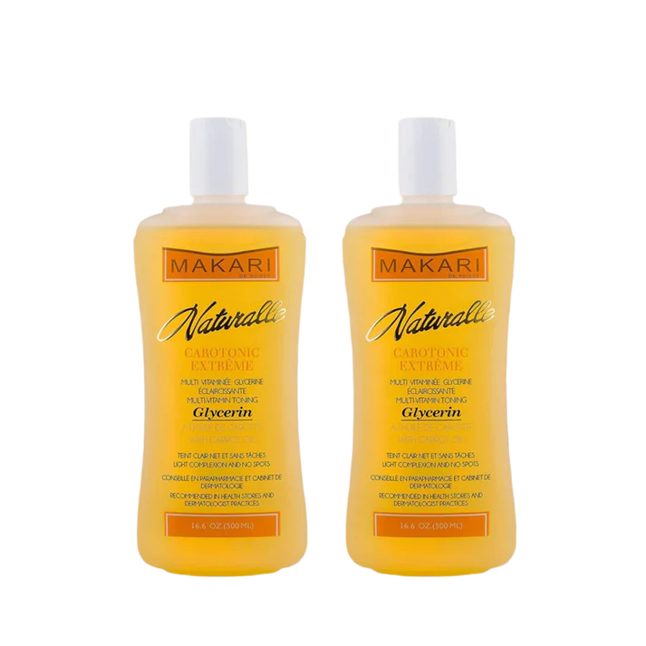 Two bottles of Makari Naturalie Carotone Extreme on a white background | Makari de Suisse Uganda