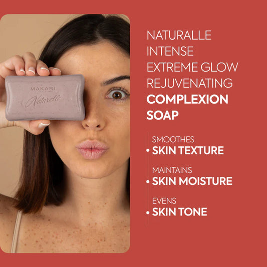 Woman holding a bar of soap with product details on a red background | Makari de Suisse Uganda